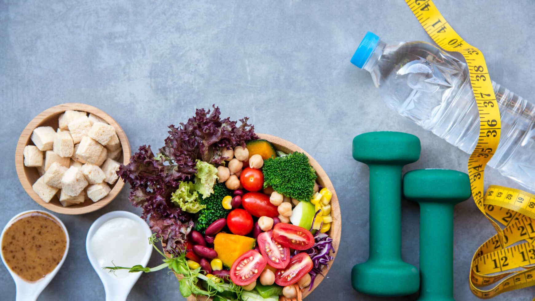 Diet and Healthy life loss weight exercise Concept. Fresh vegetable salad with Weight scale measure prevention for women diet slimming. Lifestyle Time and Healthy