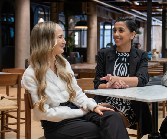 People sitting by the table