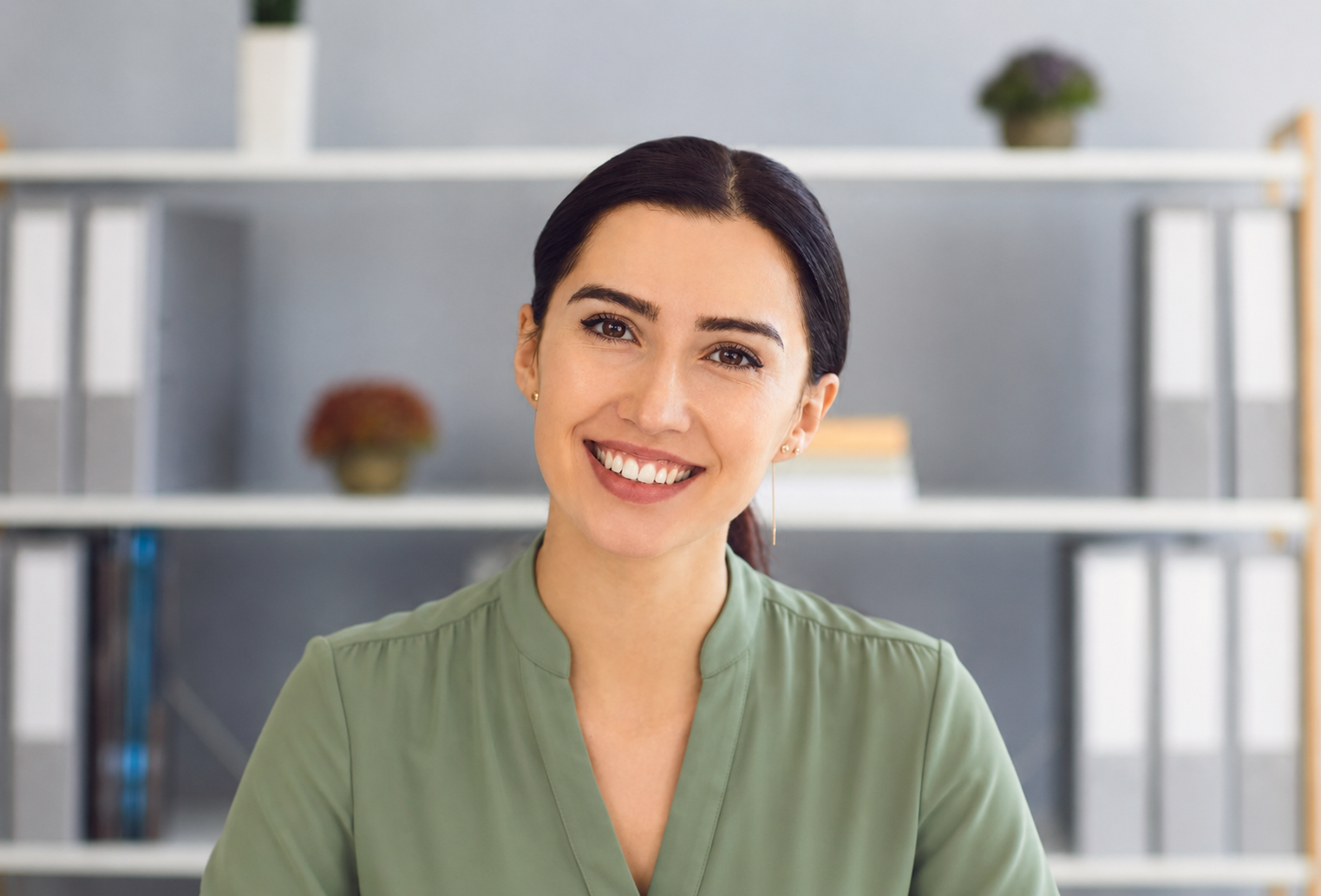 Female healthcare practitioner smiling warmly